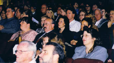 The audience is engrossed with the speakers. 
