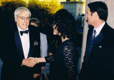 Kevin McCarthy greets Janet Farber as Bruce Crawford leads them inside. 